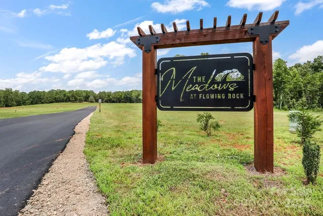 a view of a street sign on the side of the road