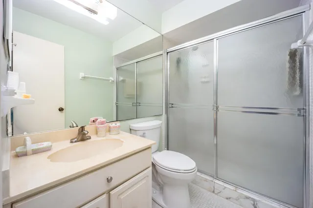 a living room with lots of furniture and a table