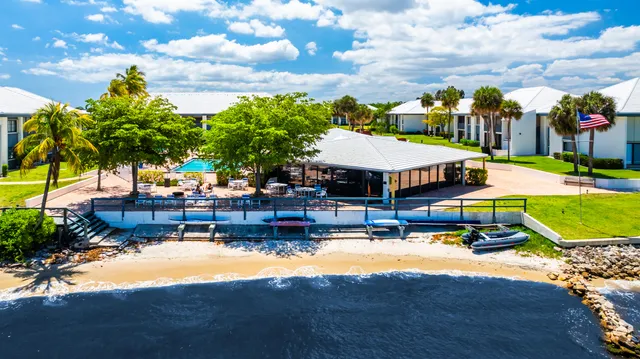 a view of a balcony with chairs
