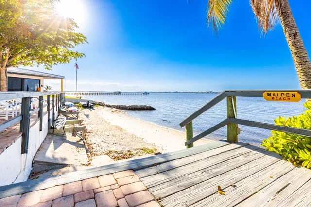 a view of a lake with a building in the background