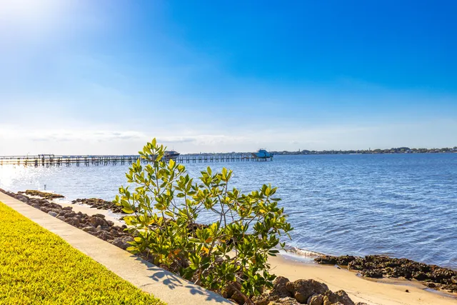 a view of swimming pool with seating space