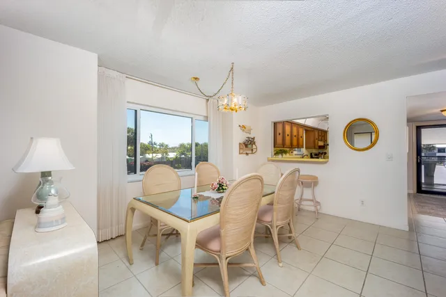 a kitchen with a sink cabinets and appliances
