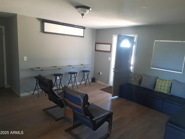 a view of a livingroom with furniture