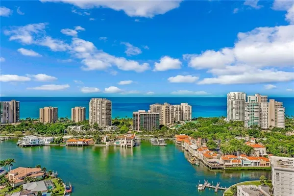 a view of a lake with a building in the background