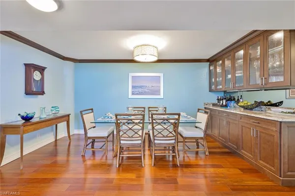 a view of a dining room with furniture