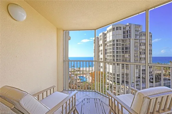 a balcony with a couch