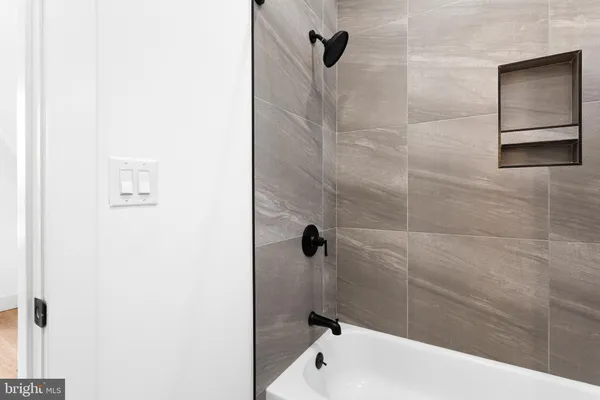 a bathroom with a bathtub