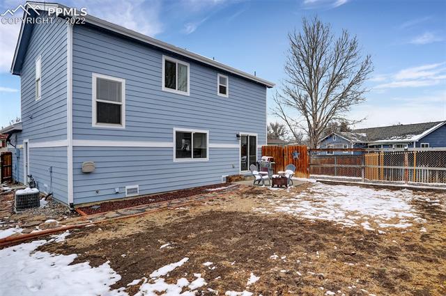1717 Keswick Road Colorado Springs, CO 80906 - Photo 21 of 23 Dog run to the right of the patio.