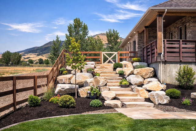 3054 West Ridgeline Road Stockton, UT 84071 - Photo 11 of 88 View of yard featuring a gate and a mountain view