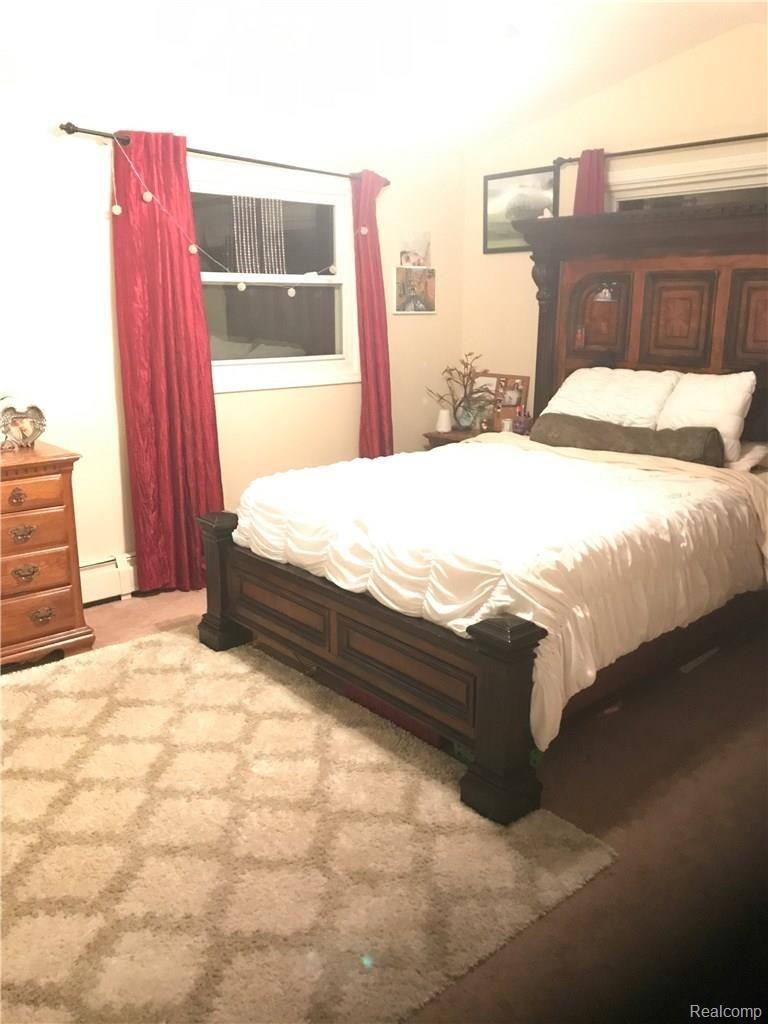 1660 Ridge Road Highland, MI 48356 - Photo 18 of 33 upstairs master bedroom 2.jpg