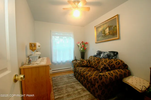 a living room with furniture and a table