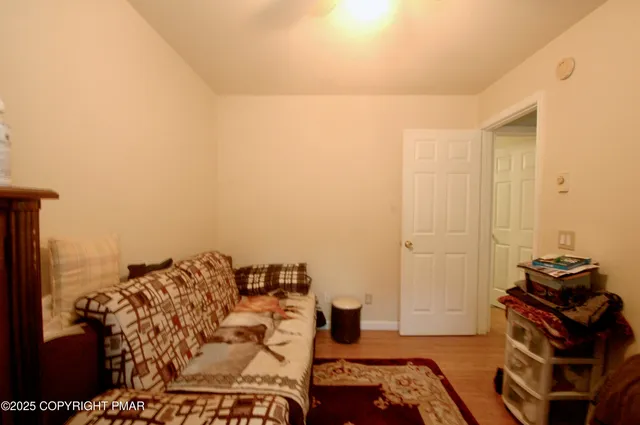 a view of a chairs and table in patio
