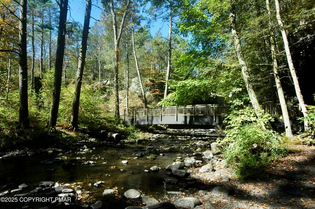 a view of swimming pool from a patio