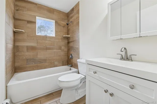 a view of a house with a yard and garage