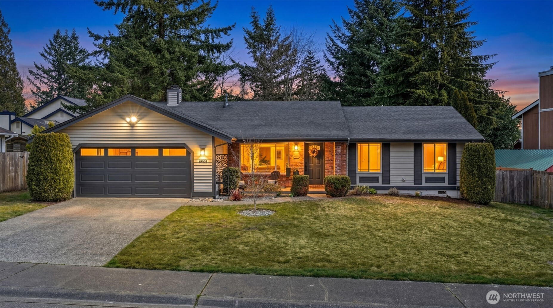 24912 168th Place Southeast Covington, WA 98042 - Photo 1 of 23 a view of a swimming pool with an outdoor seating and a yard