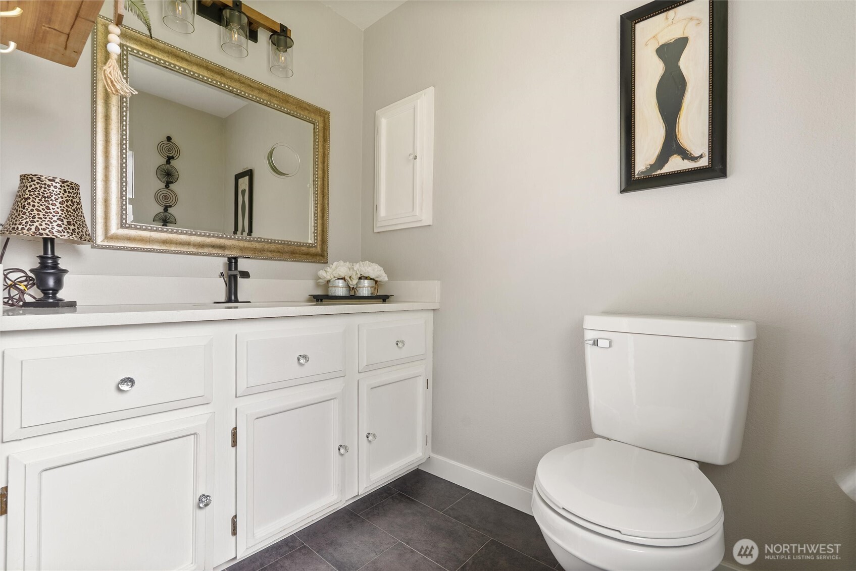 24912 168th Place Southeast Covington, WA 98042 - Photo 14 of 23 a bathroom with a toilet sink and mirror