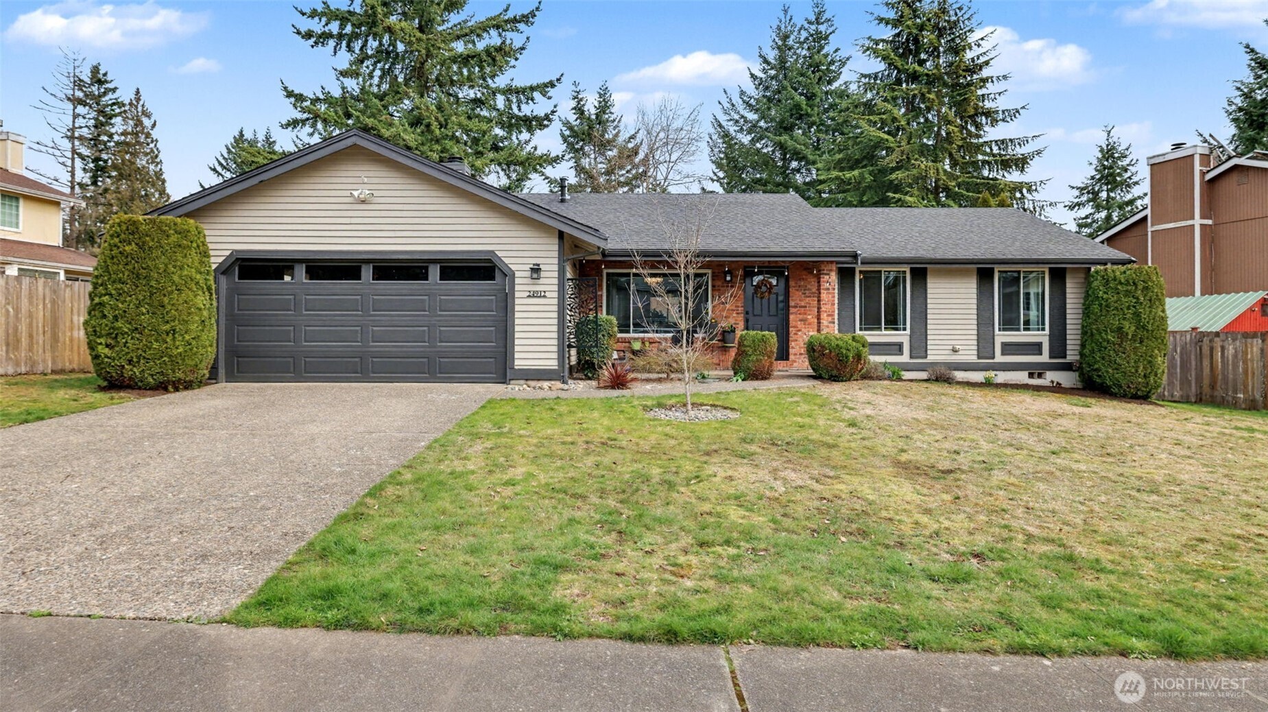 24912 168th Place Southeast Covington, WA 98042 - Photo 23 of 23 a front view of a house with yard and green space