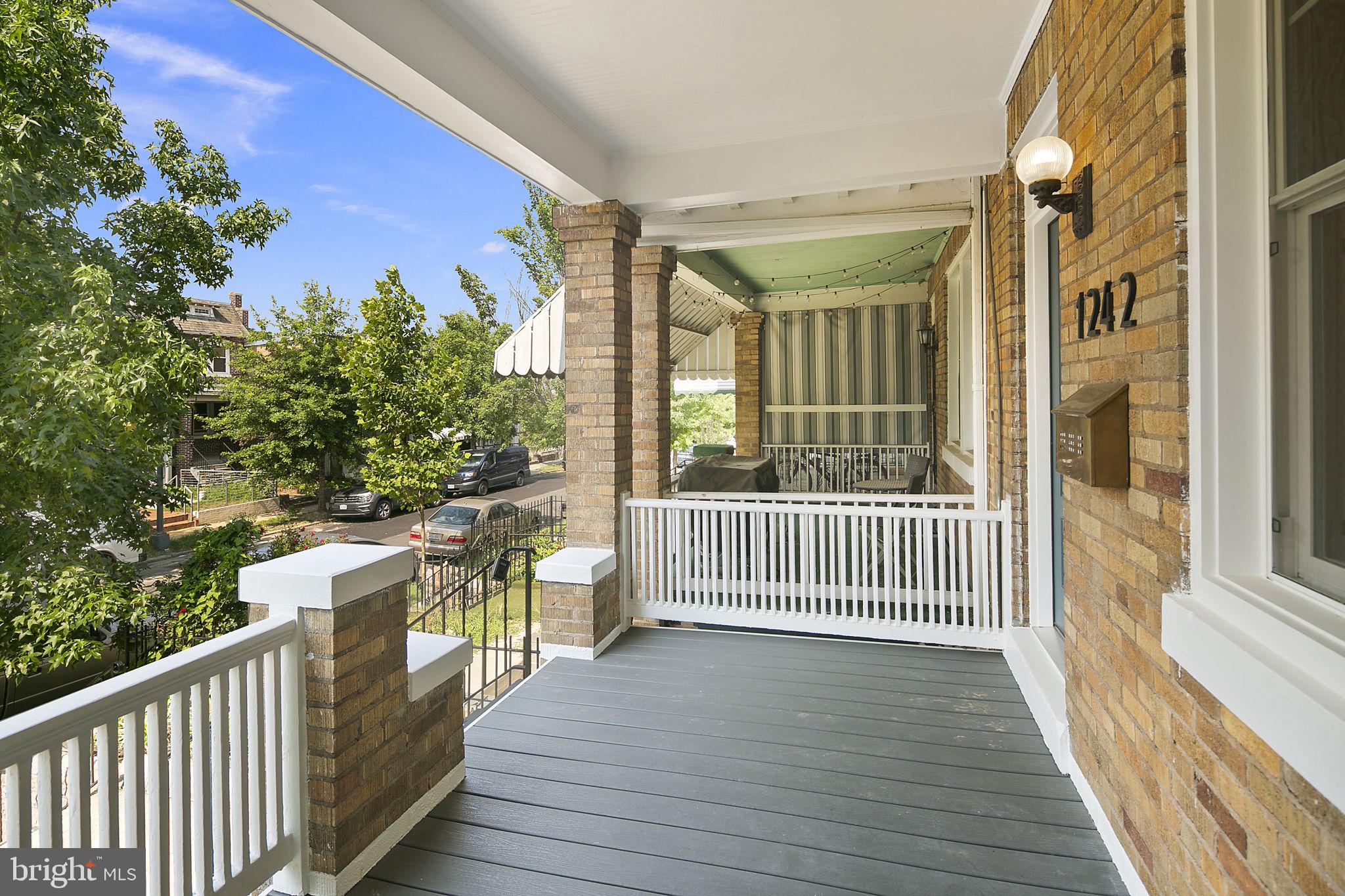 1242 Oates Street Northeast Washington, DC 20002 - Photo 19 of 47 a view of a house with a porch