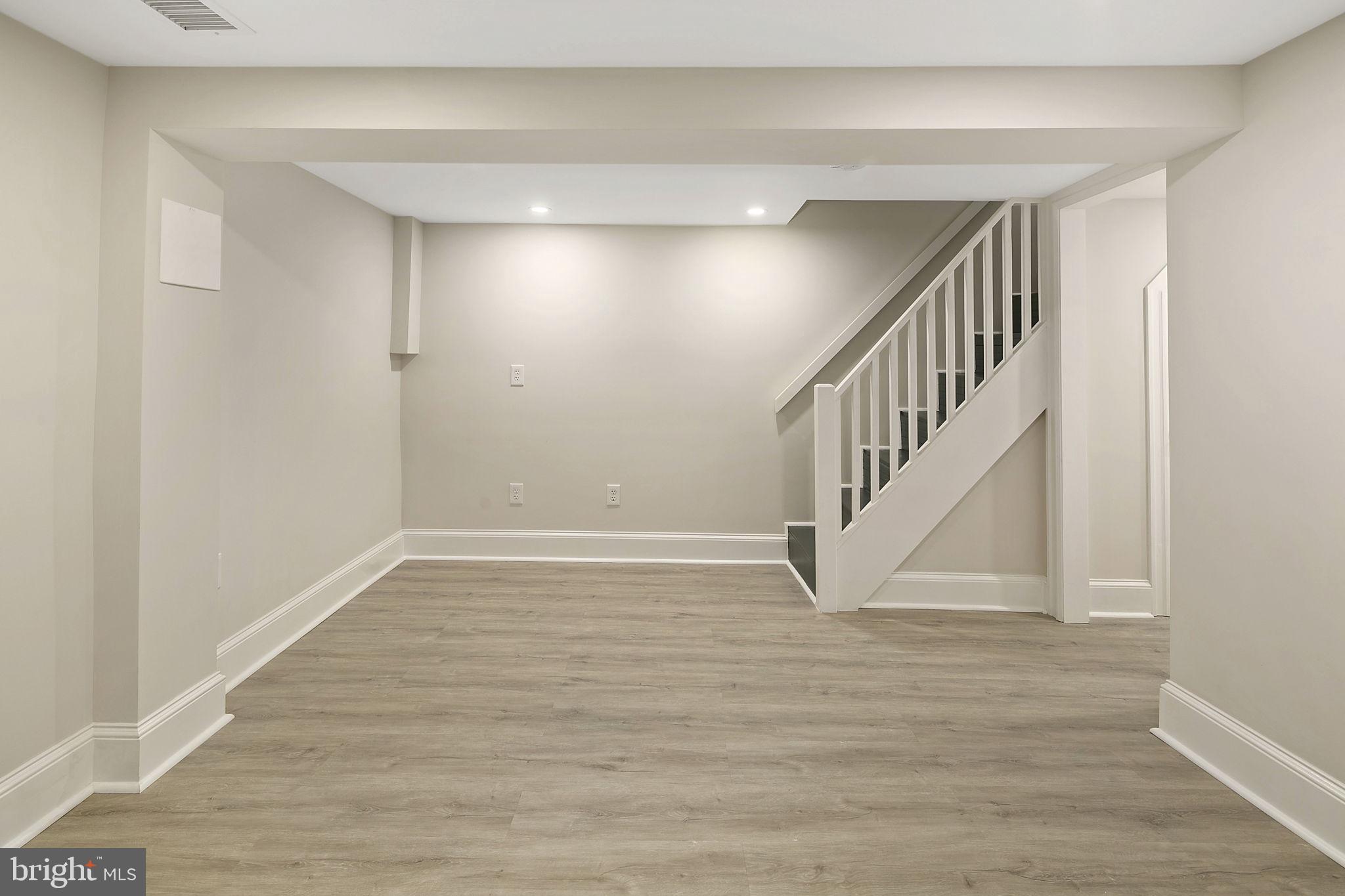 1242 Oates Street Northeast Washington, DC 20002 - Photo 30 of 47 a view of entryway with wooden floor