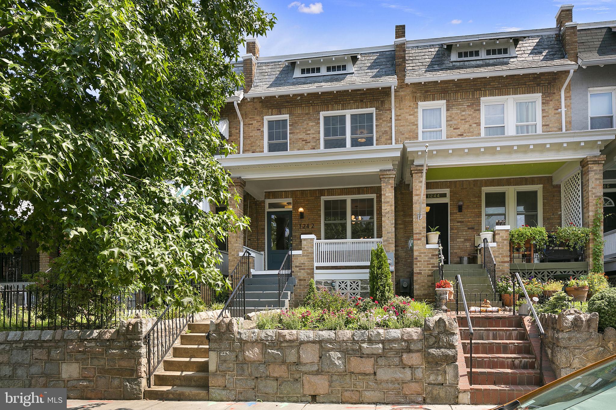 1242 Oates Street Northeast Washington, DC 20002 - Photo 47 of 47 a front view of a house with outdoor seating