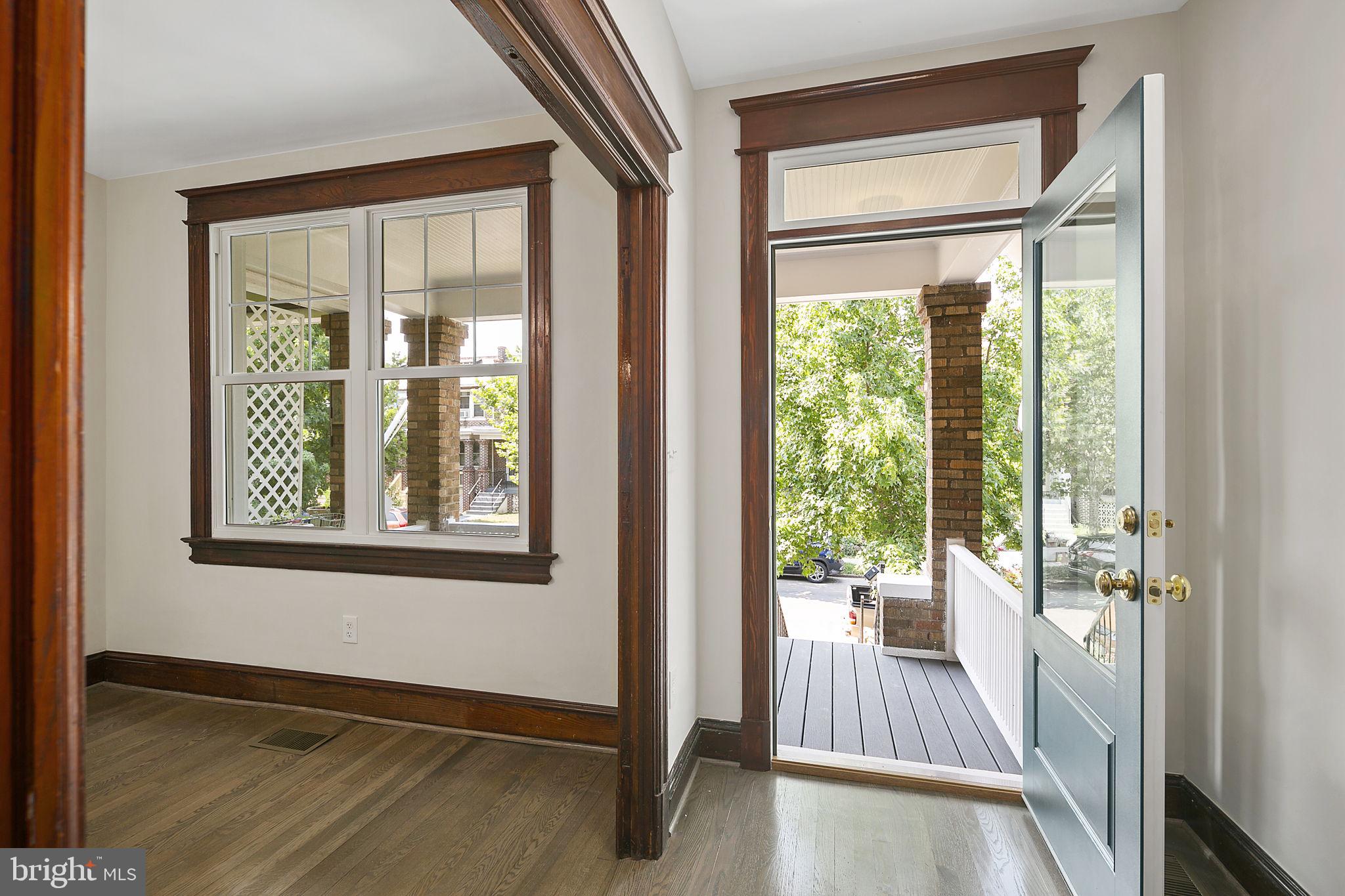 1242 Oates Street Northeast Washington, DC 20002 - Photo 6 of 47 a view of a porch with wooden floor and front door