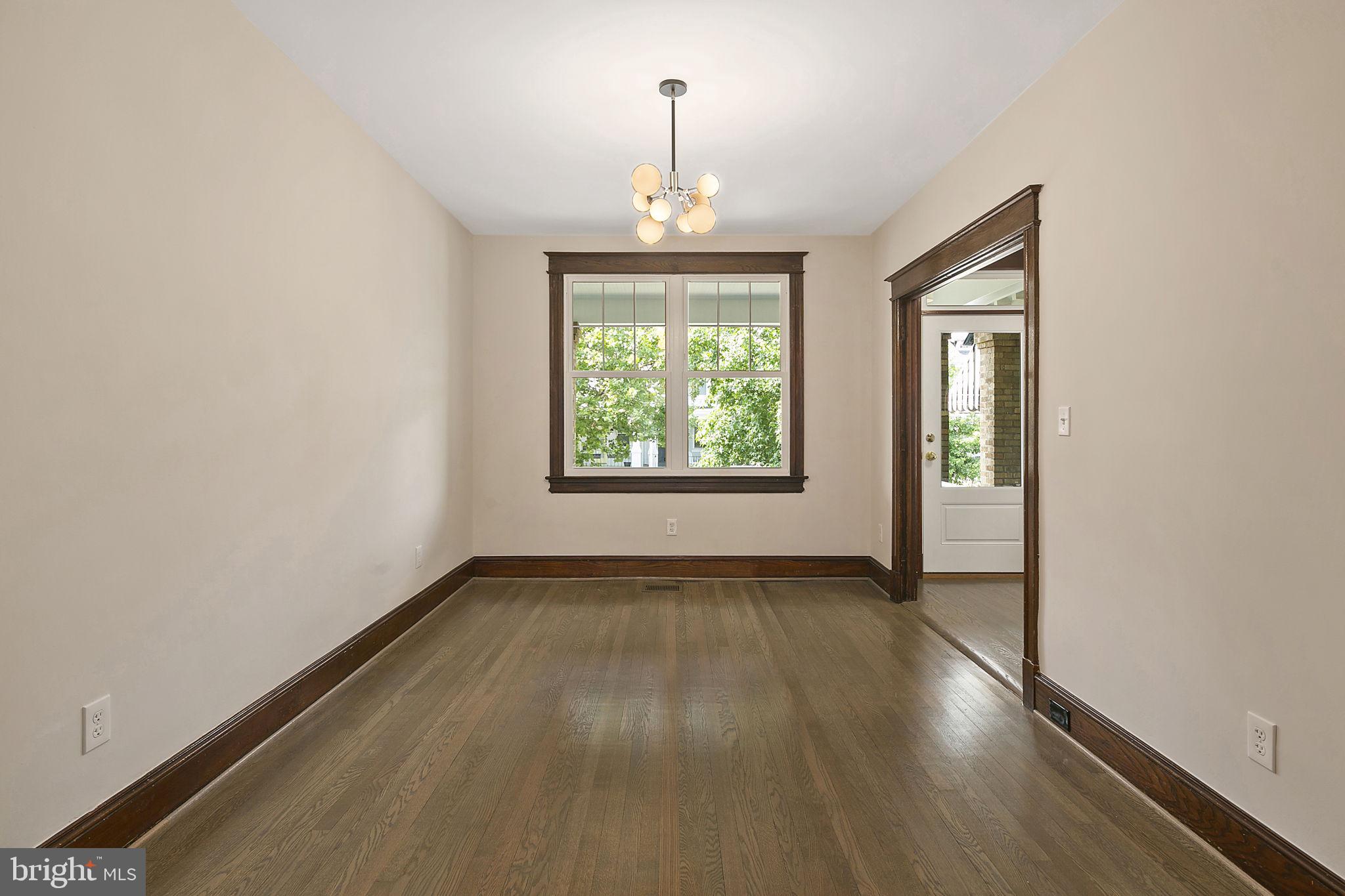 1242 Oates Street Northeast Washington, DC 20002 - Photo 7 of 47 an empty room that has a window in it