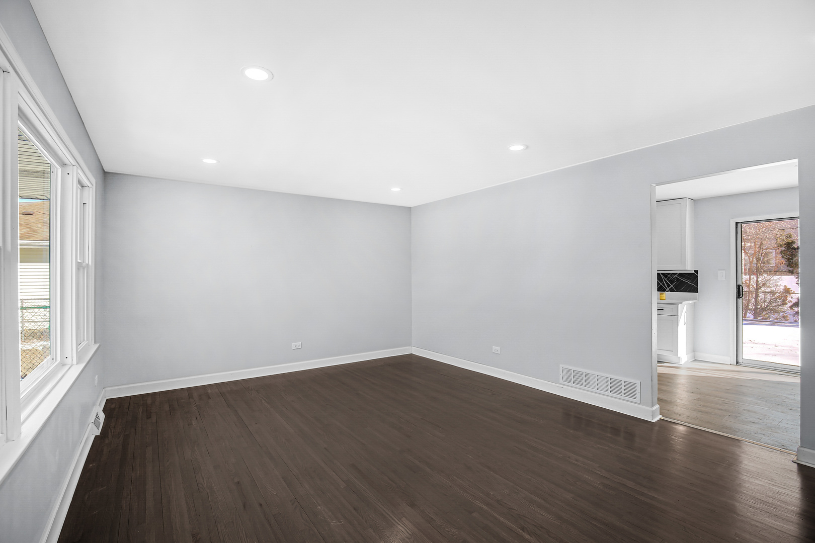 16779 92nd Avenue Orland Hills, IL 60487 - Photo 17 of 26 a view of a room with wooden floor and window