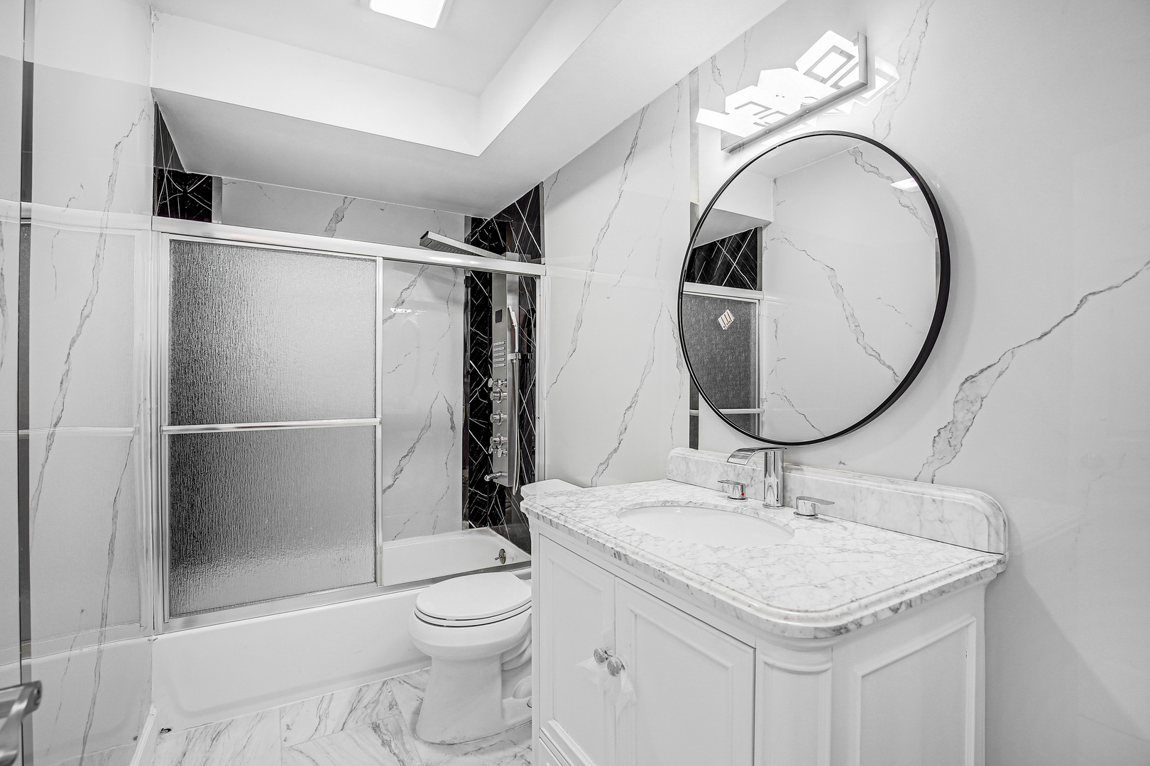 16779 92nd Avenue Orland Hills, IL 60487 - Photo 22 of 26 a bathroom with a sink a toilet and a mirror