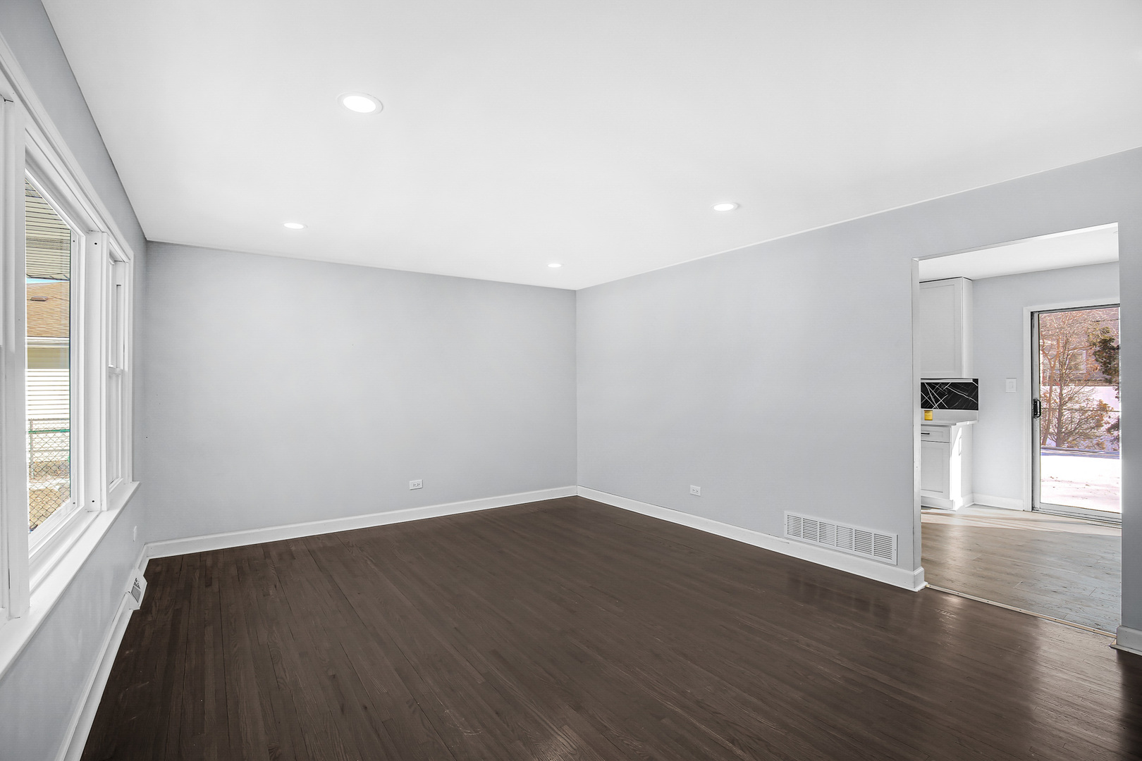16779 92nd Avenue Orland Hills, IL 60487 - Photo 7 of 26 a view of a room with wooden floor and window