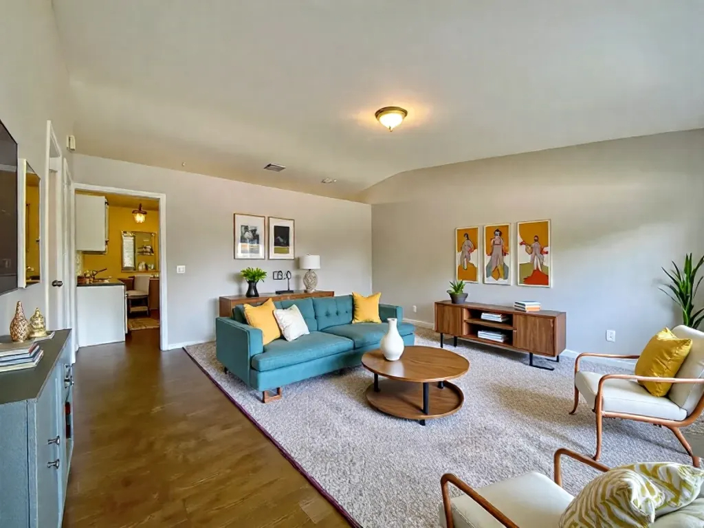 317 East Schaumburg Road Streamwood, IL 60107 - Photo 2 of 25 a living room with furniture and a couch