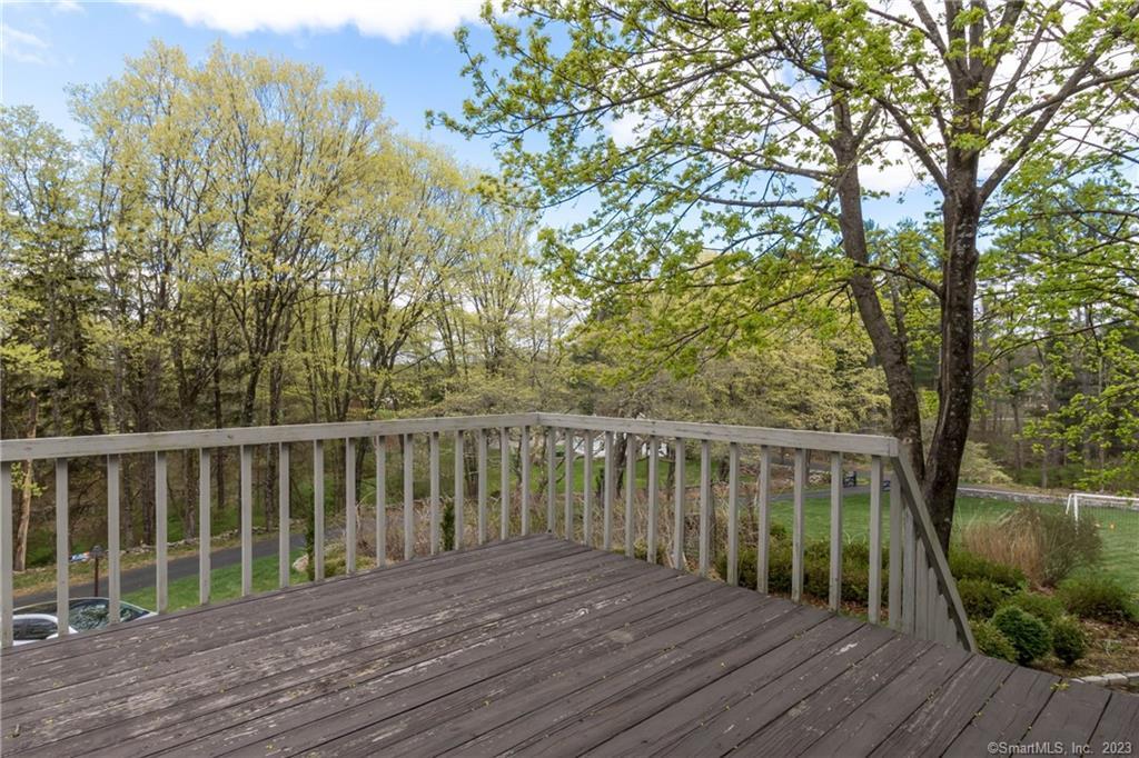 241 Maple Road Easton, CT 06612 - Photo 19 of 21 a view of balcony with wooden floor and fence