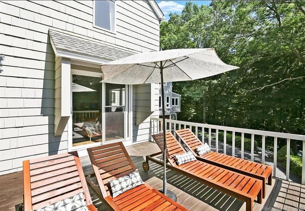 241 Maple Road Easton, CT 06612 - Photo 4 of 21 a balcony view with a seating space