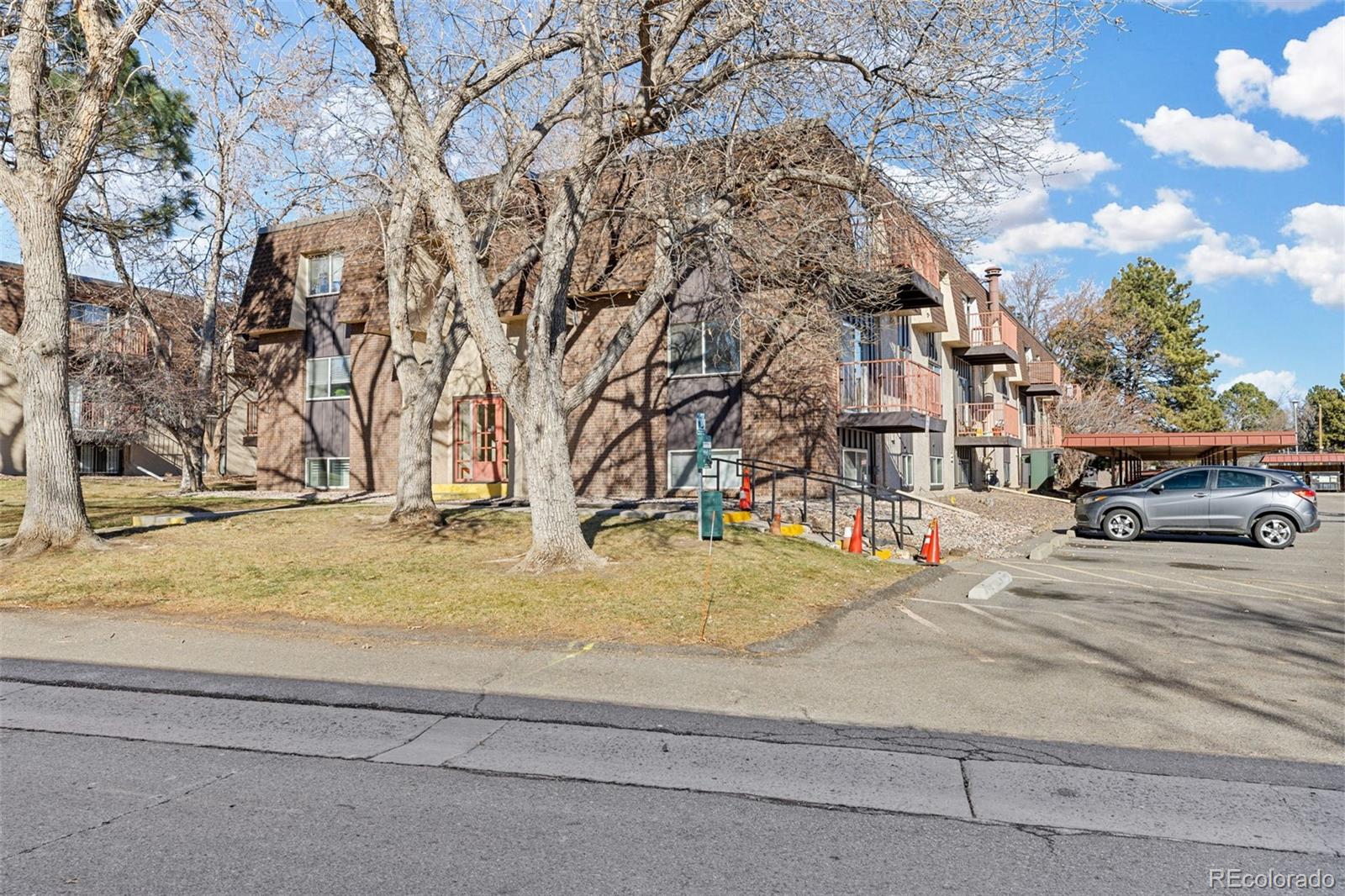 7755 East Quincy Avenue, Unit 303A5 Denver, CO 80237 - Photo 34 of 35 a view of road with large trees