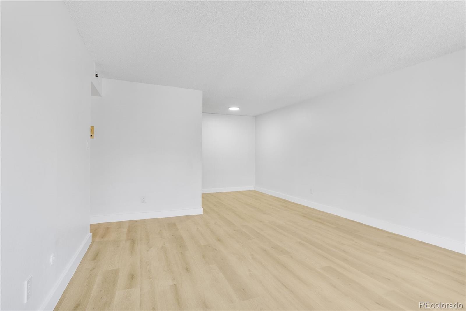 7755 East Quincy Avenue, Unit 303A5 Denver, CO 80237 - Photo 7 of 35 a view of an empty room