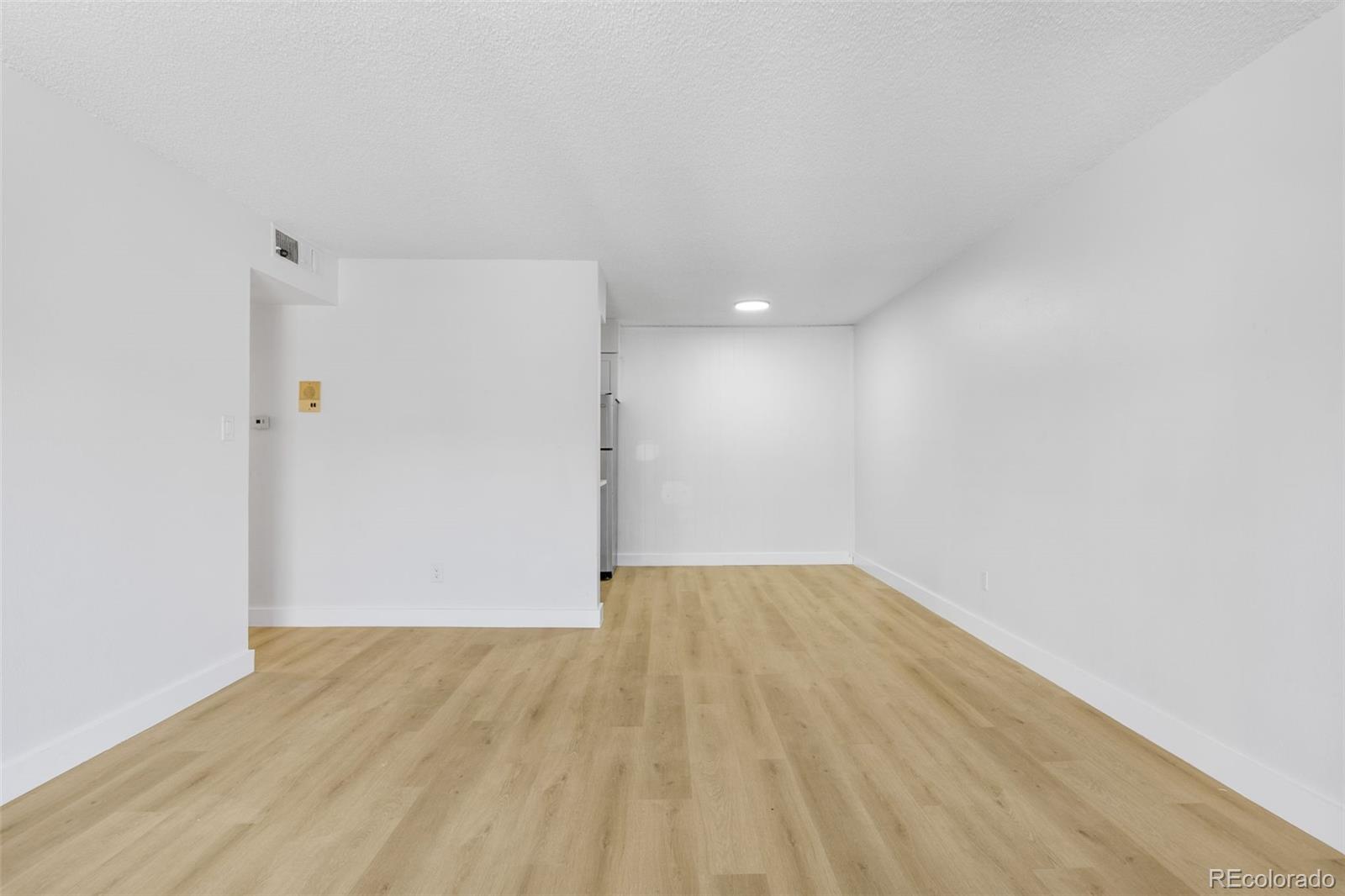 7755 East Quincy Avenue, Unit 303A5 Denver, CO 80237 - Photo 9 of 35 a view of an empty room
