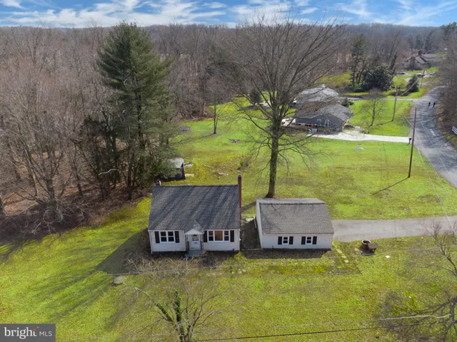 a swimming pool with some trees in the background