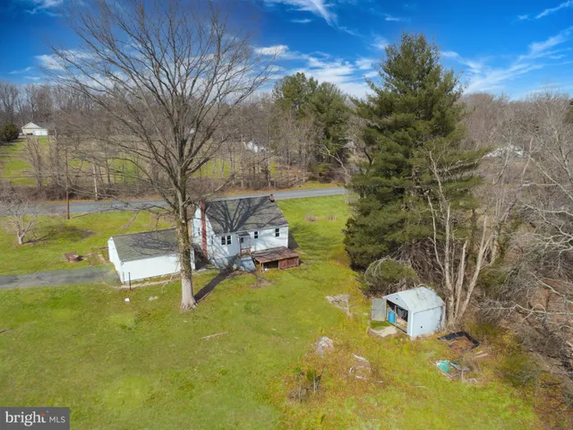 a view of a lake with a yard