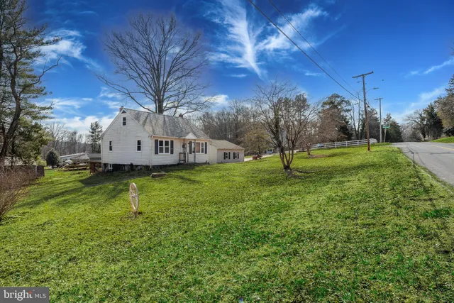 a view of a house with a big yard