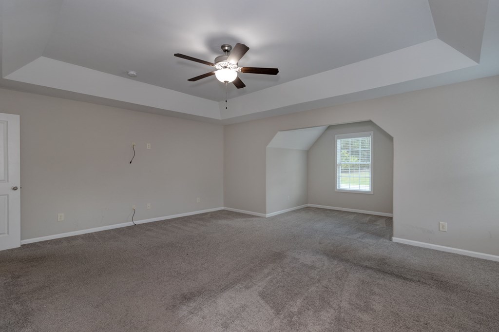 104 Pin Oak Way Hamilton, GA 31811 - Photo 20 of 41 a view of an empty room with a window