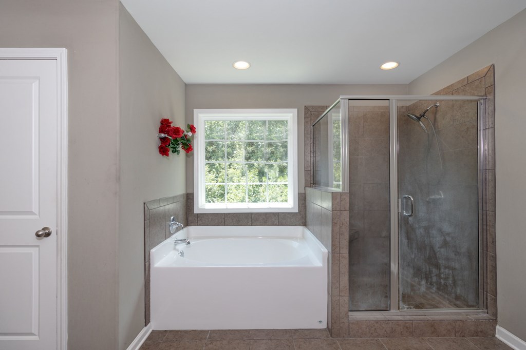 104 Pin Oak Way Hamilton, GA 31811 - Photo 21 of 41 a view of bathroom with bathtub and shower