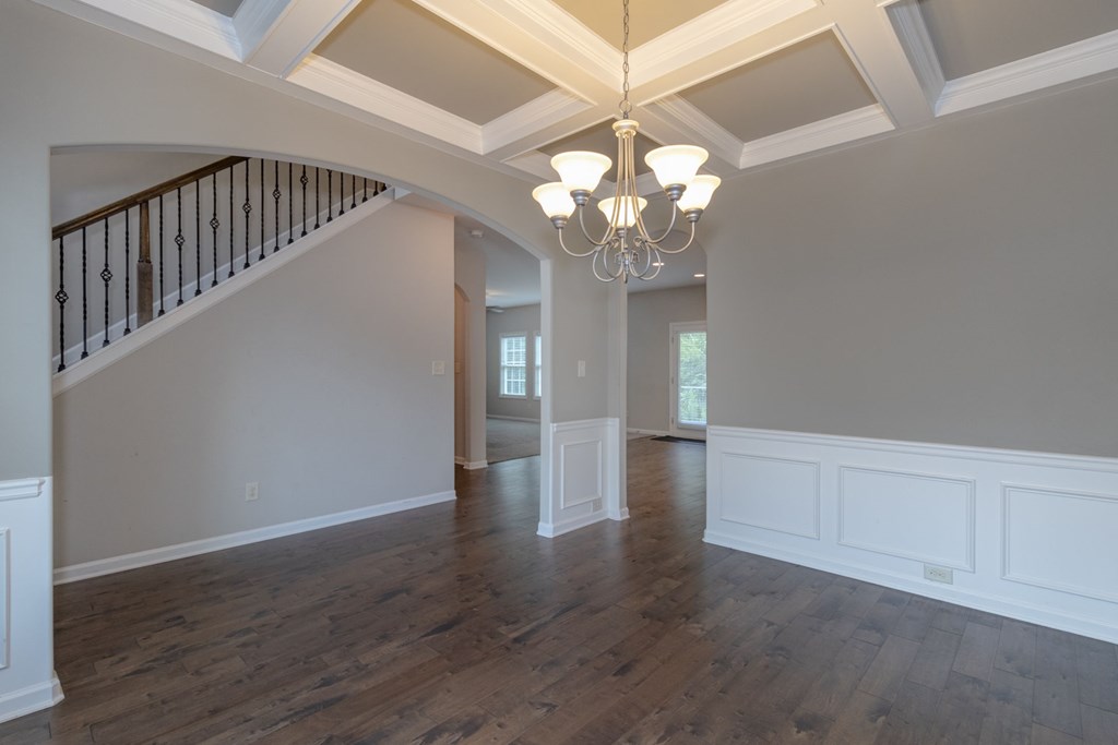 104 Pin Oak Way Hamilton, GA 31811 - Photo 3 of 41 wooden floor in an empty room with a window
