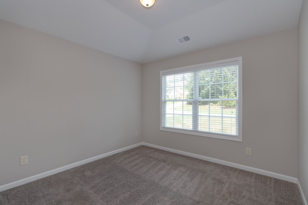 104 Pin Oak Way Hamilton, GA 31811 - Photo 31 of 41 an empty room with a window