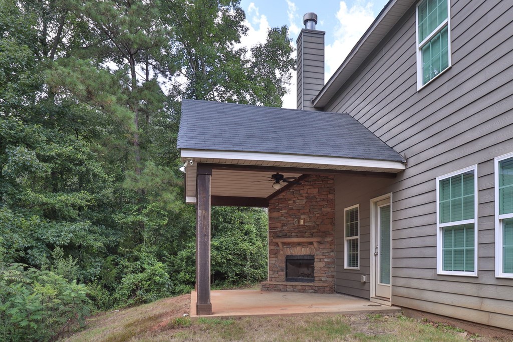 104 Pin Oak Way Hamilton, GA 31811 - Photo 33 of 41 a view of a house with a yard plants and large tree