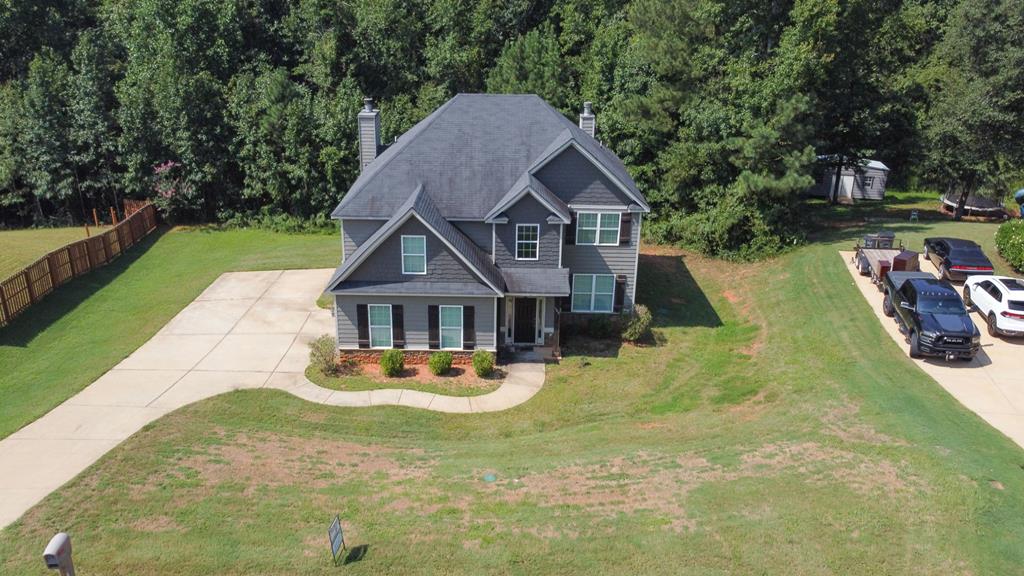 104 Pin Oak Way Hamilton, GA 31811 - Photo 36 of 41 a view of a house with a yard
