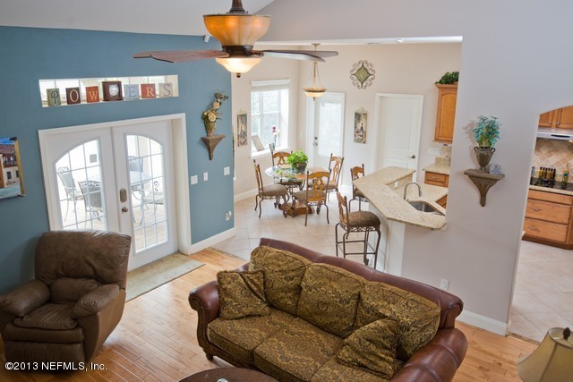 3385 Kings Road South St. Augustine, FL 32086 - Photo 15 of 36 a living room with furniture and a potted plant
