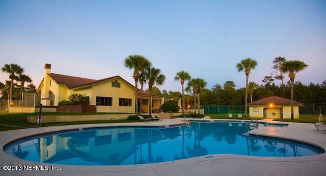3385 Kings Road South St. Augustine, FL 32086 - Photo 36 of 36 a view of a house with pool and a yard