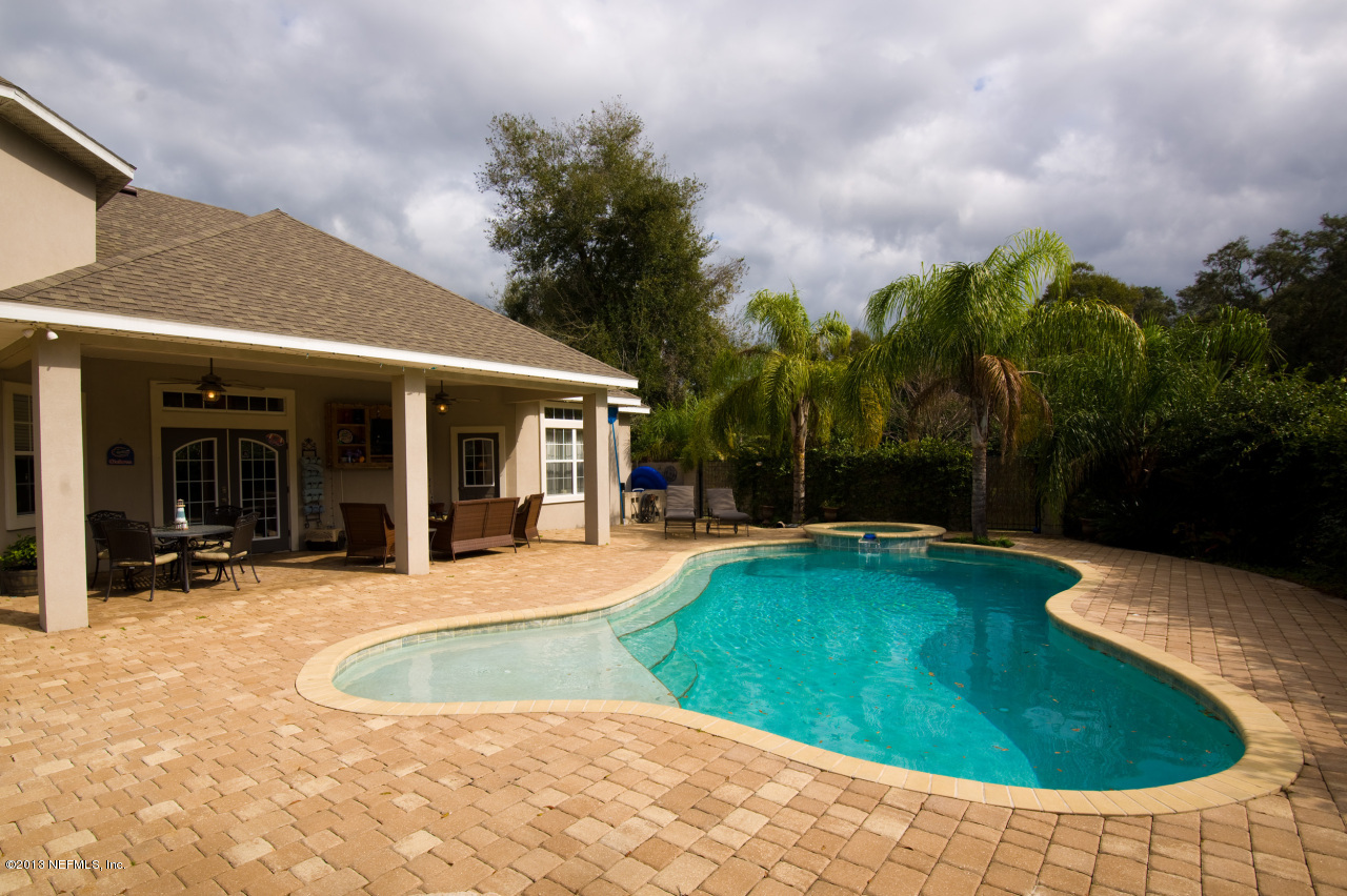 3385 Kings Road South St. Augustine, FL 32086 - Photo 5 of 36 a view of a house with swimming pool and porch with furniture