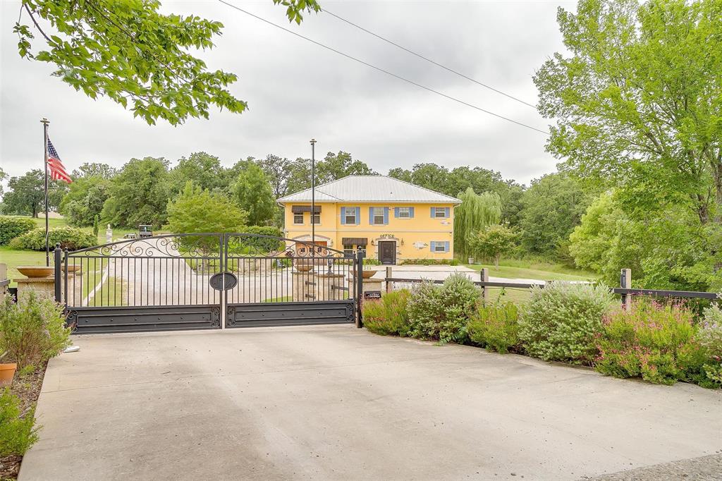 a view of a fence in front of house