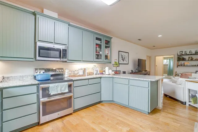 a view of a lake with a garden and lake view