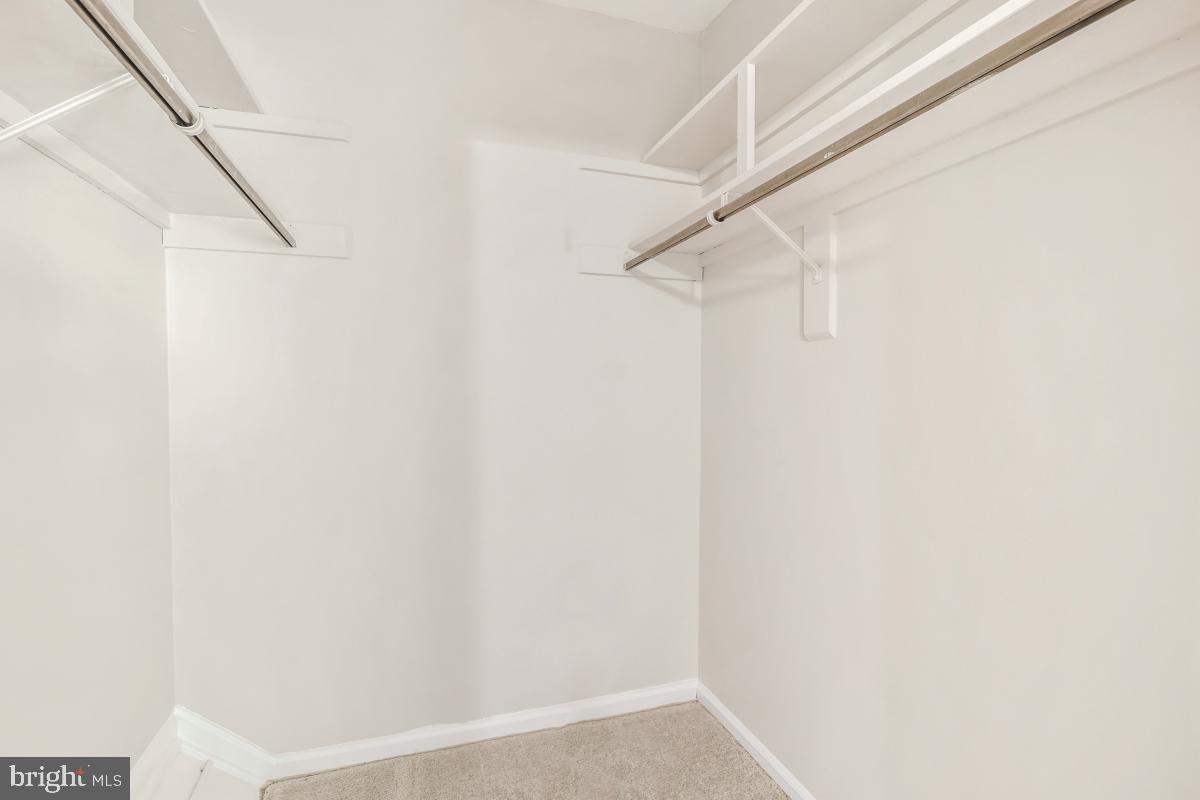 8345 Forrester Boulevard Springfield, VA 22152 - Photo 17 of 30 Walk-in closet with two built-in coat racks